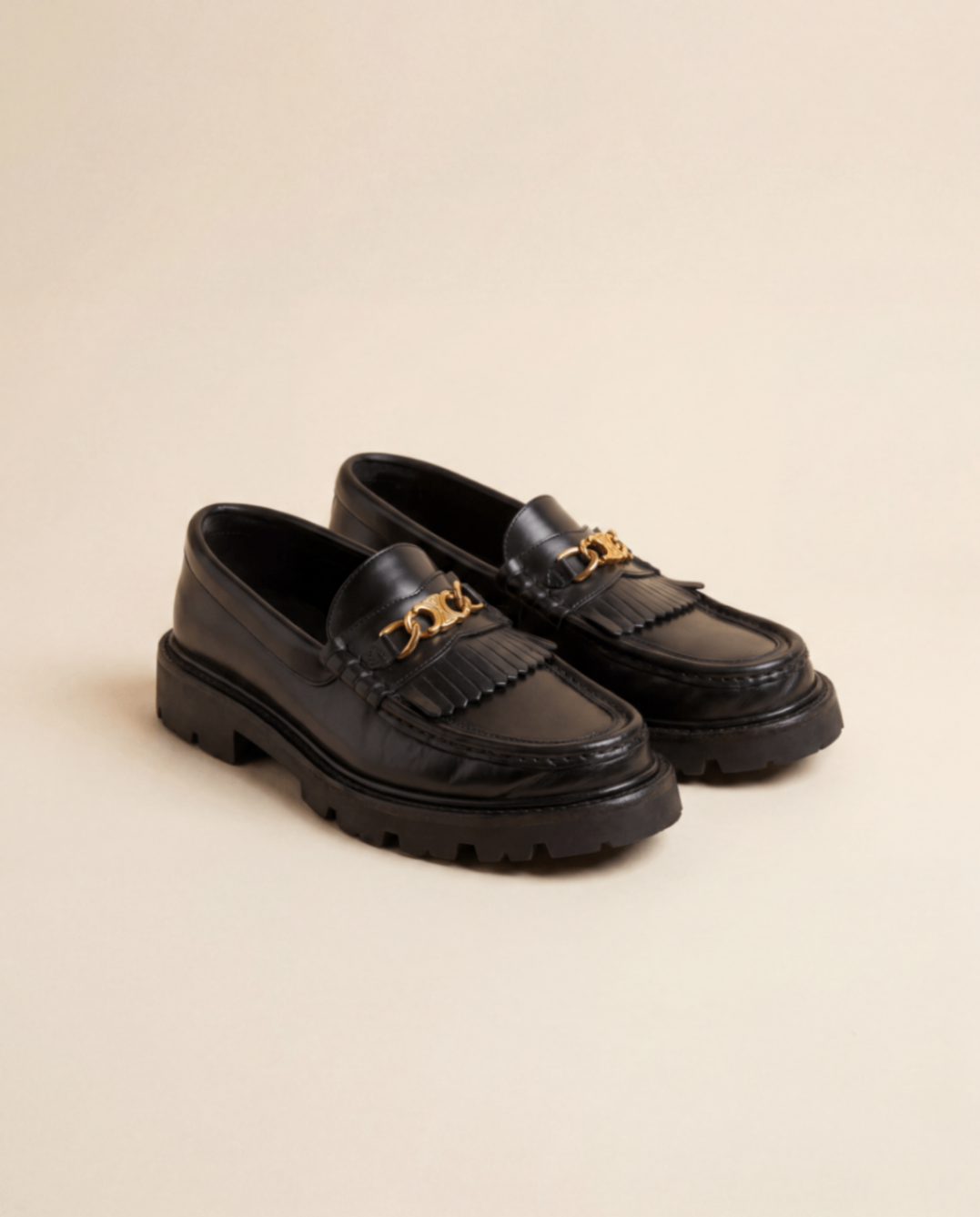 Celine – Mocassins Margaret cuir de taureau noir chaîne Triomphe – P.38
