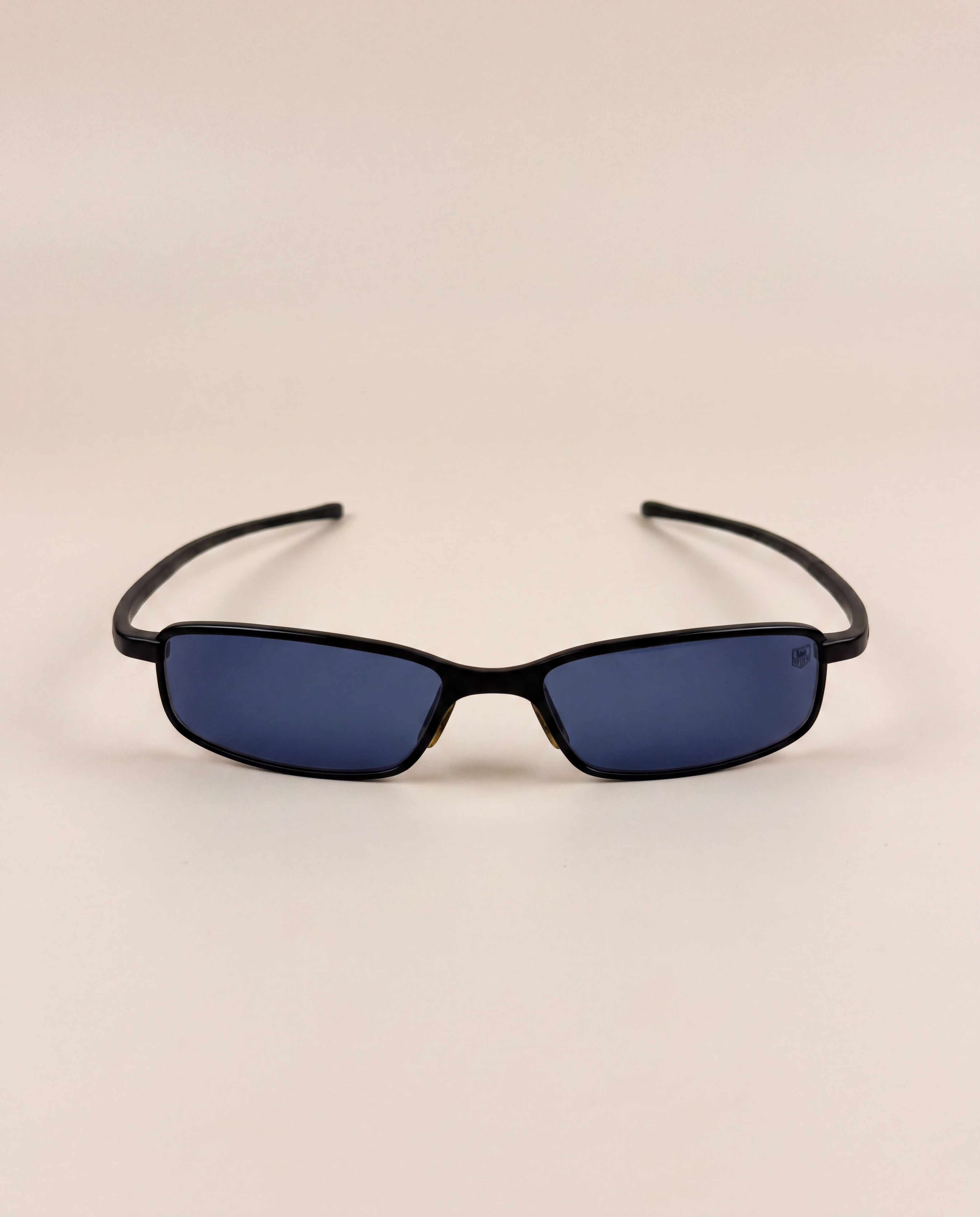 Lunettes de soleil TAG Heuer en titane noir et verres bleus