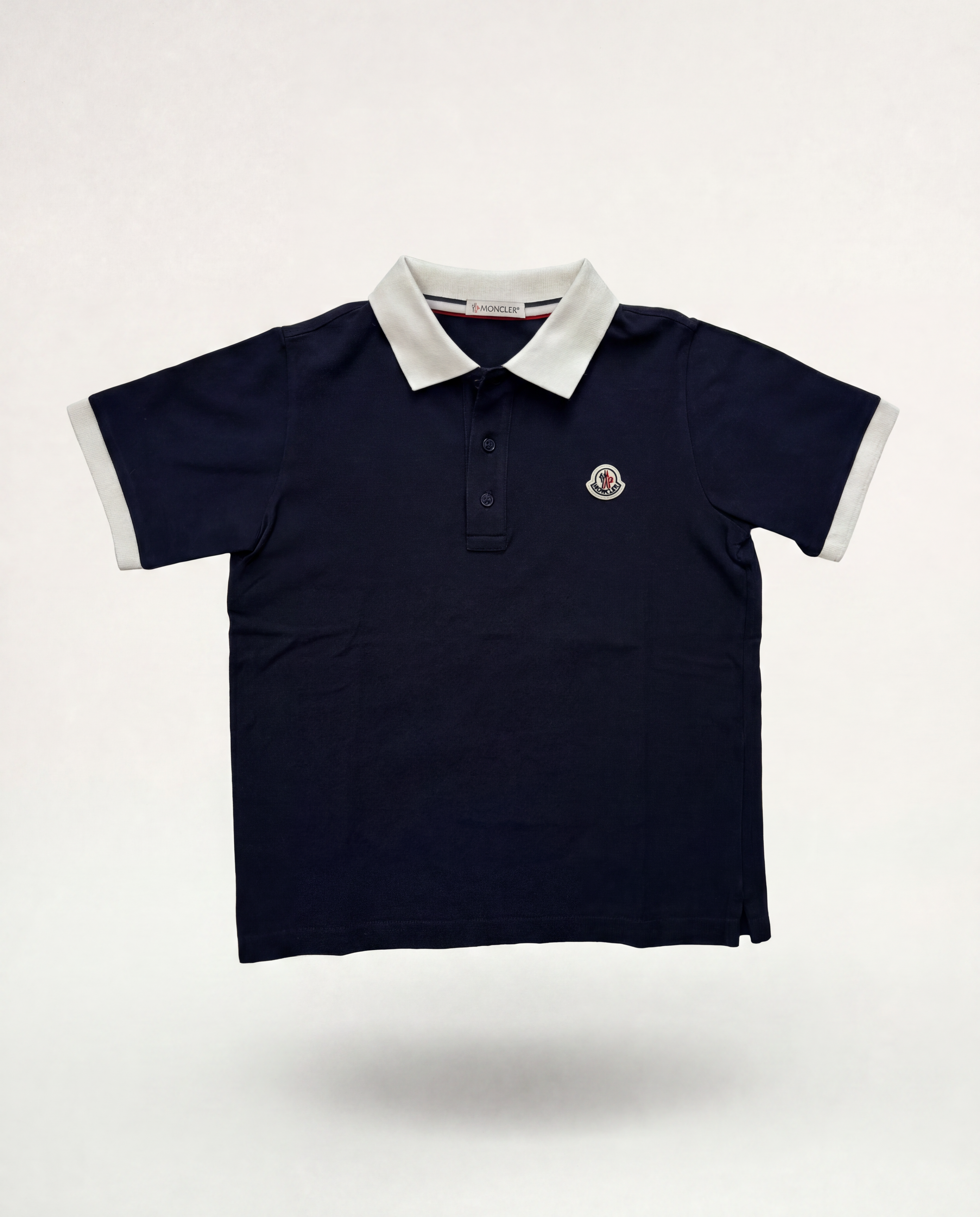 Polo Moncler enfant bleu marine patch logo tricolore – Taille 10 ans