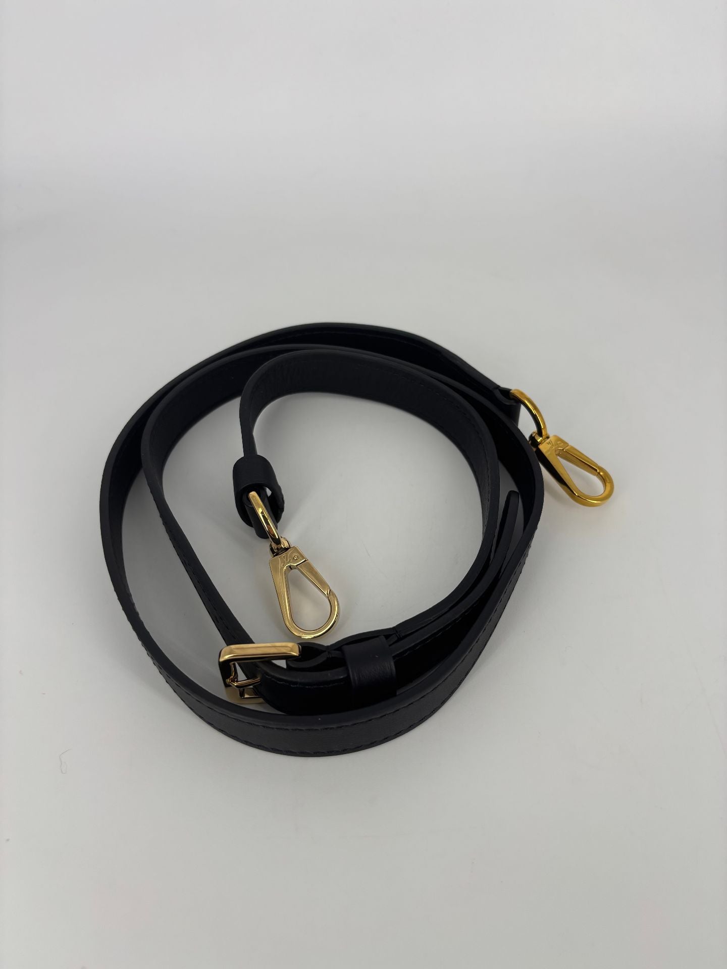 Bandoulière Louis Vuitton cuir noir crochets dorés