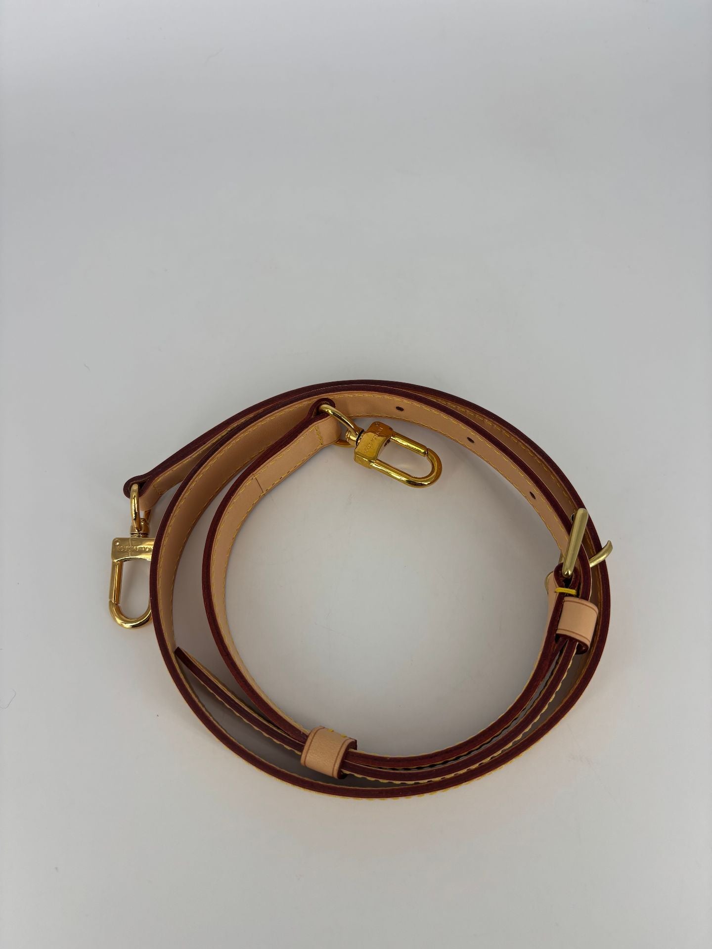 Bandoulière Louis Vuitton cuir beige réglable crochets dorés