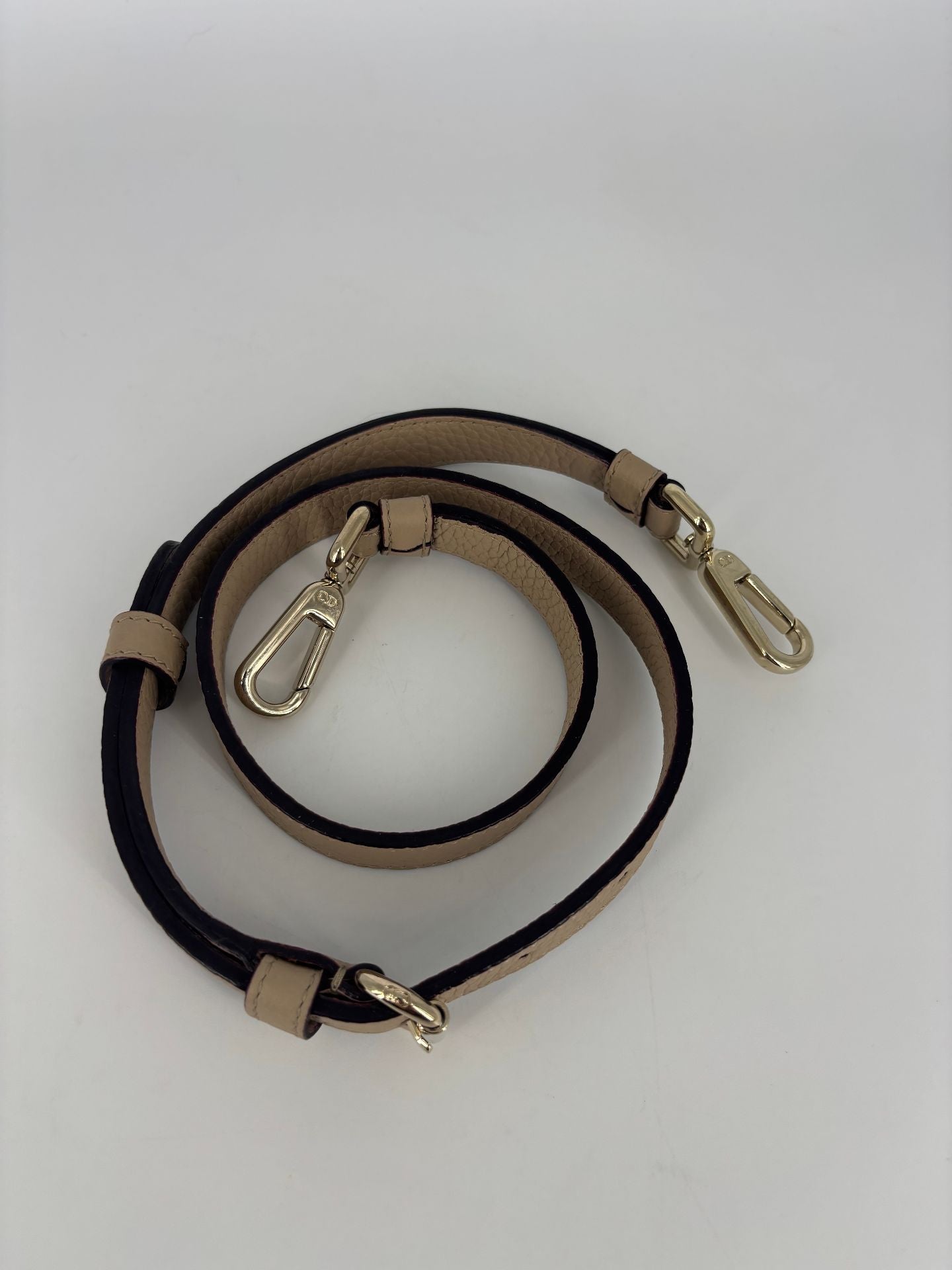 Bandoulière Dior cuir grainé beige embout doré