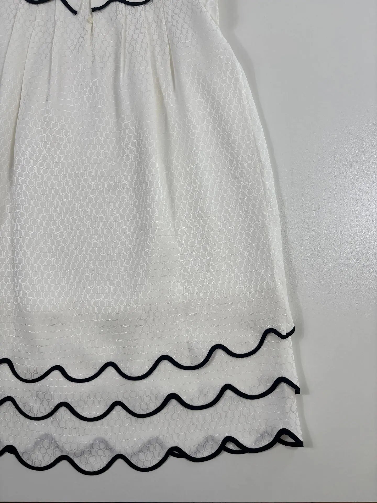 Robe GG jacquard blanche à col volant Gucci – 10 ans Gucci
